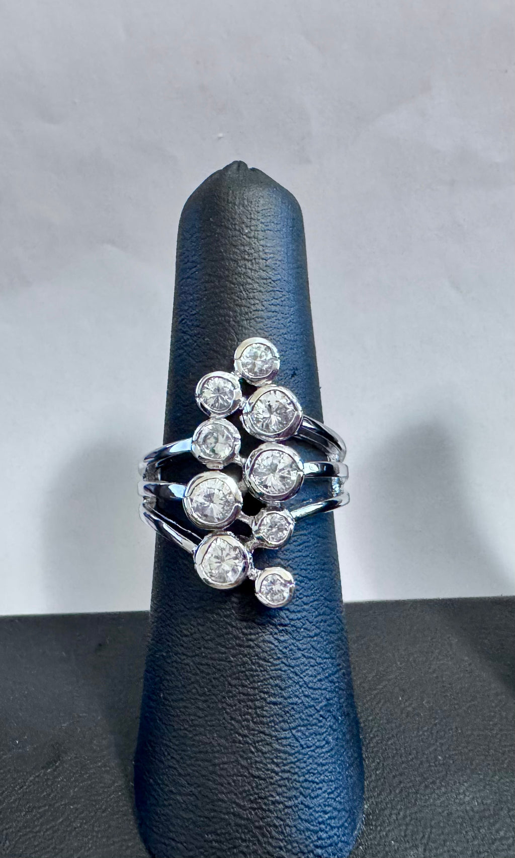 .925 Sterling Silver Bezel Set Triple Shank 9-Stone Cubic Zirconia